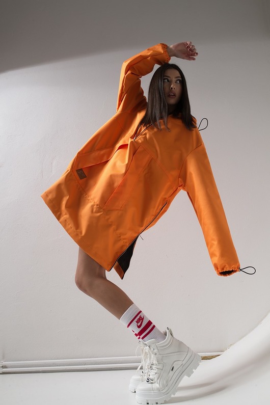 kurtki damskie Kurtka wiatrówkaanorak  longline pomarańcz