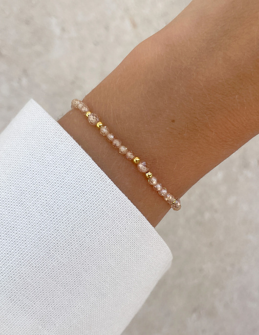 bransoletki z kamieni naturalnych Bransoletka na gumce z cyrkonii szampańskiej z hematytem