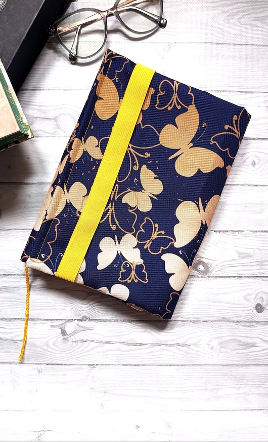 pokrowce i etui - różne Etui pokrowiec otulacz na książkę