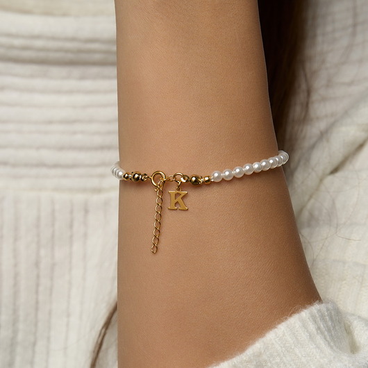 bransoletki złote Bransoletka perły 4mm literka srebra 925 pozłacanego (literka do wyboru)