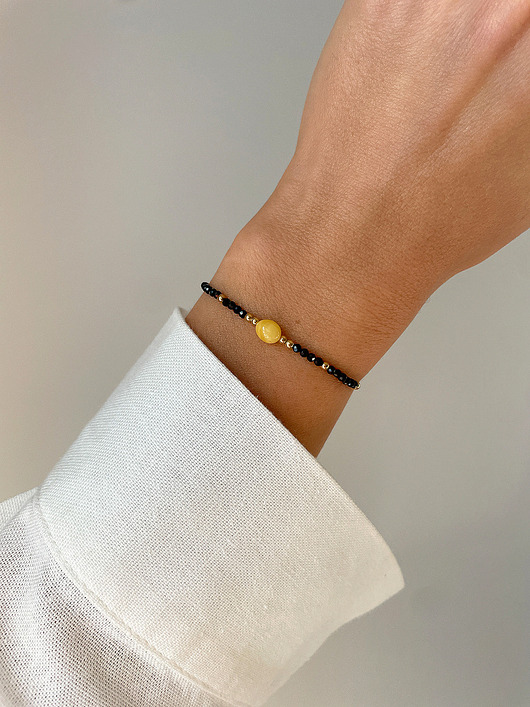 bransoletki z kamieni naturalnych Bransoletka na nici z czarnym turmalinem i bursztynem mlecznym