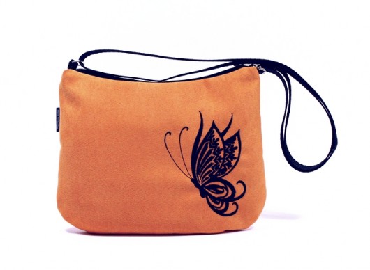 white butterfly on orange RękaProduction