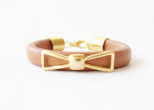 Gold bow braceland