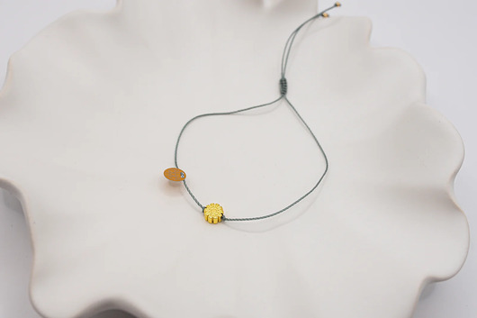 bransoletki z kamieni naturalnych Bransoletka ze złotym Kwiatem