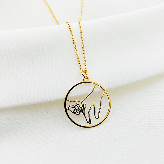 złote naszyjniki Naszyjnik mama i dziecko splecione dłonie