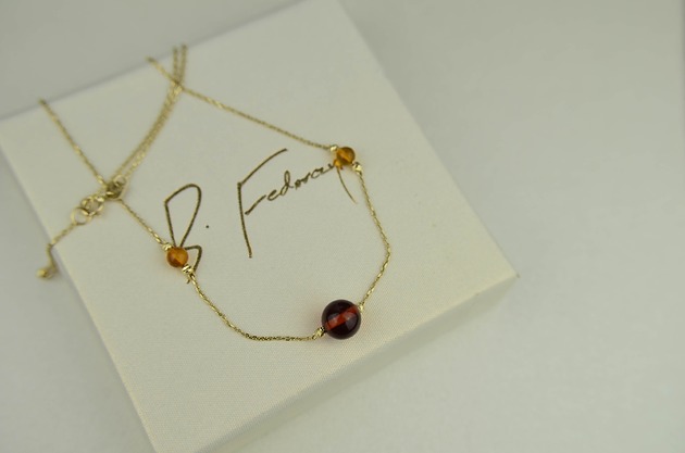 złote naszyjniki Złoty naszyjnik z koniakowym bursztynem pr. 585