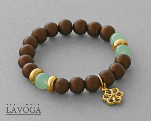 Glass pearl with flower pendant in brown. Lavoga