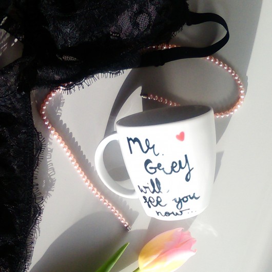 GREY: Mr. Grey will see you now my mug company