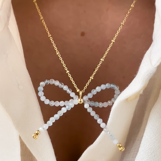 złote naszyjniki Naszyjnik z kokardką akwamaryn