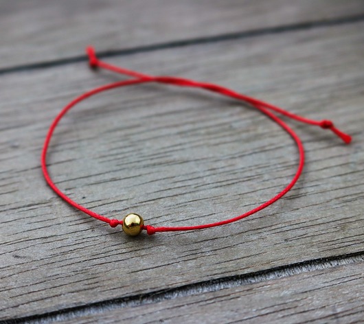 Bransoletka sznurkowa na szczęście  z kulką Coccola JEWELLERY