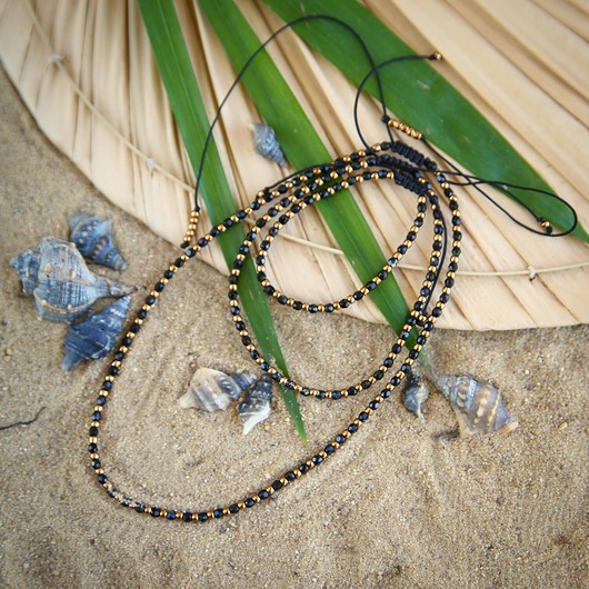 komplet biżuterii Złoty/czarny zestaw na rękę, na szyję, na kostkę