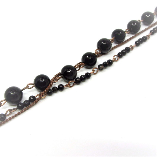 bransoletki z kamieni naturalnych Bransoletka z turmalinem i czarnym onyksem