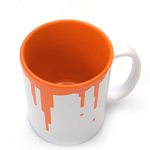 Wylewa się Pomarańczowy Kubek ONE MUG A DAY