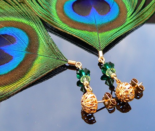 pawie oka i kryształ Swarovski Stella