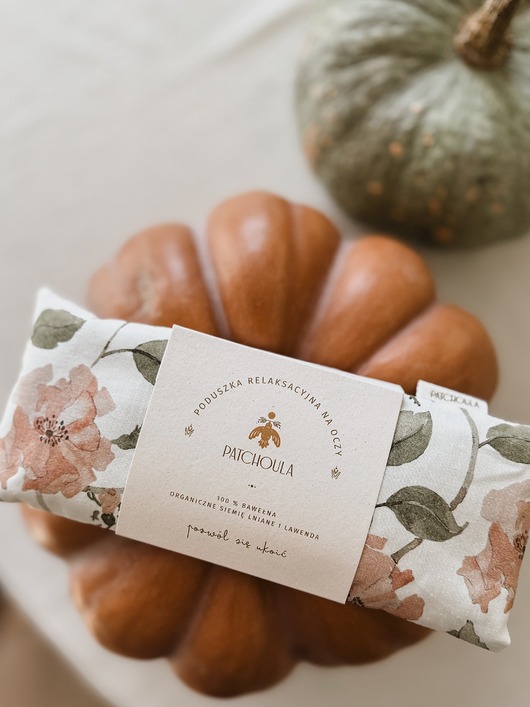 akcesoria do jogi Poduszka relaksacyjna na oczy z ekologicznymi nasionami lnu i kwiatami lawendy.