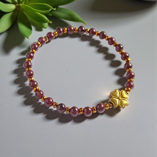 bransoletki z kamieni naturalnych Na szczęście : granat, hematyt : czterolistna koniczynka