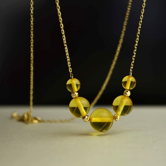 złote naszyjniki Złota kolia ze słonecznym bursztynem pr. 585