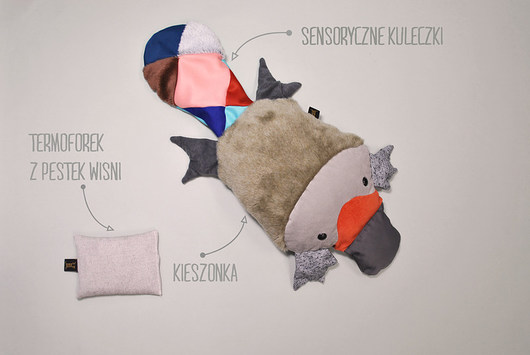 Dziobak z szeleszczącym ogonkiem i termoforkiem  Kokodyl