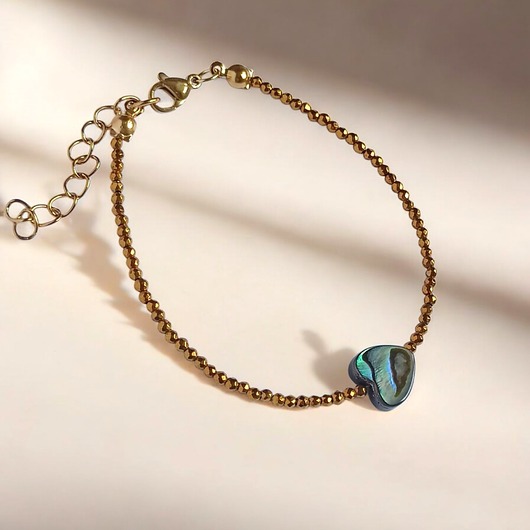 bransoletki z kamieni naturalnych Bransoletka z serduszkiem : muszla PAUA, hematyt złoty